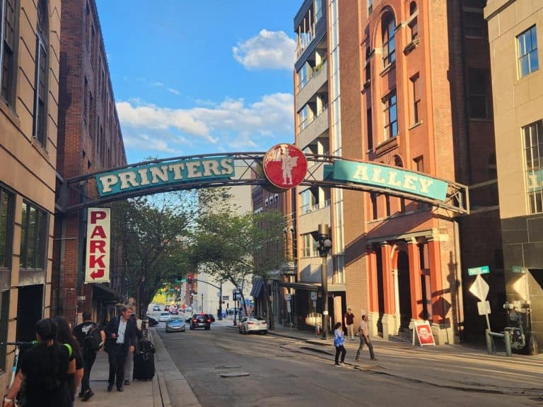 Exploring fun areas like Printers Alley in Nashville is a fun reason to move to Tennessee.