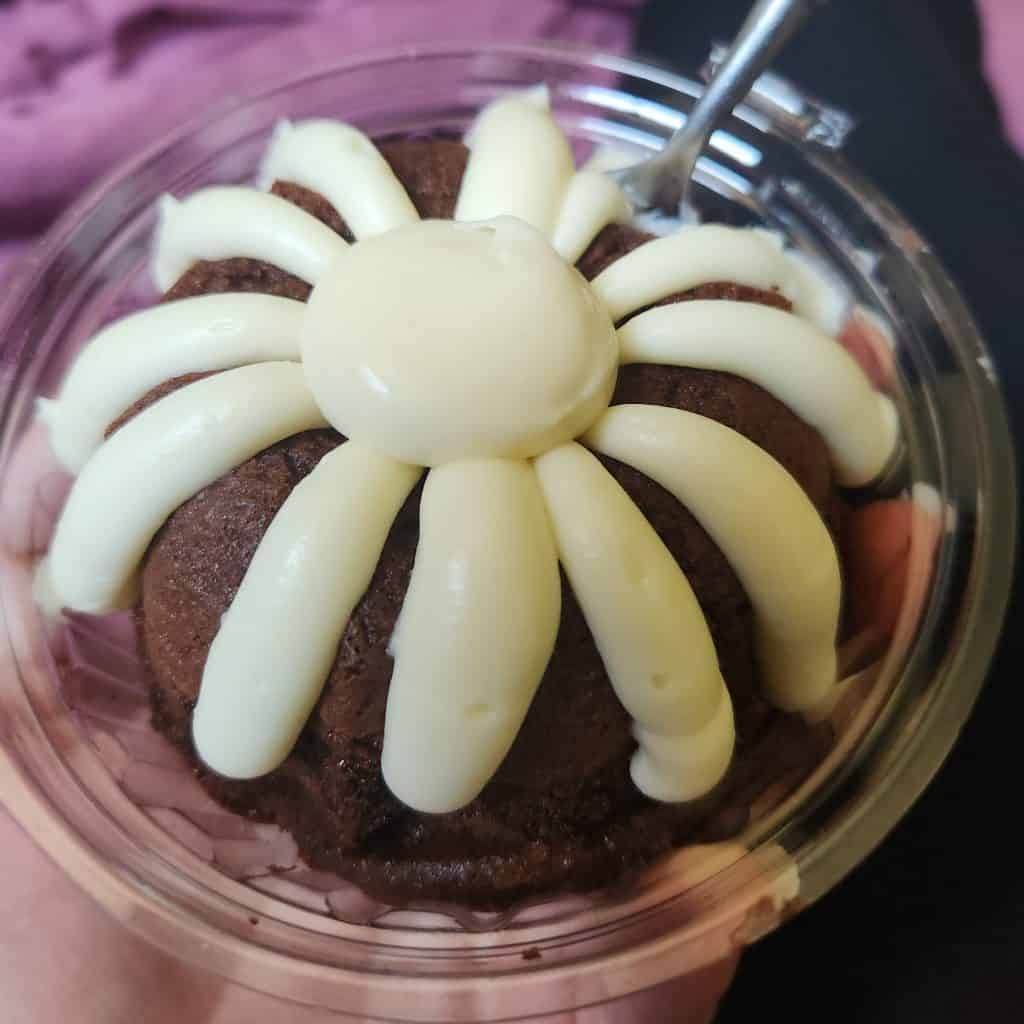 Enjoying a bundlet from Nothing Bundt Cakes.