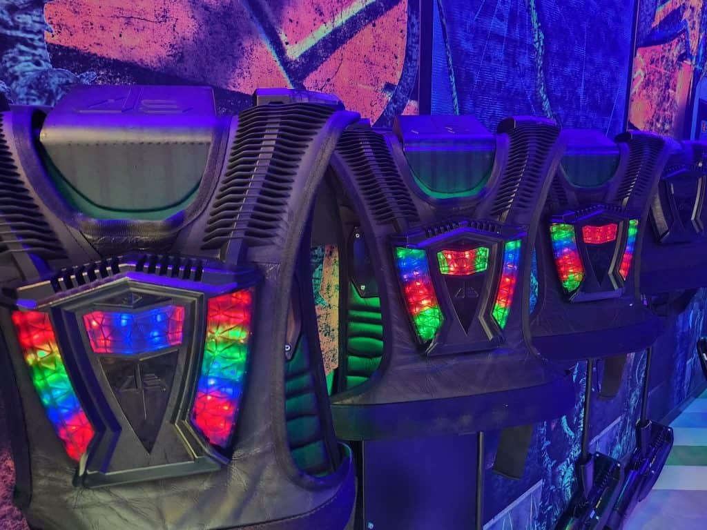 A line of laser tag vests.
