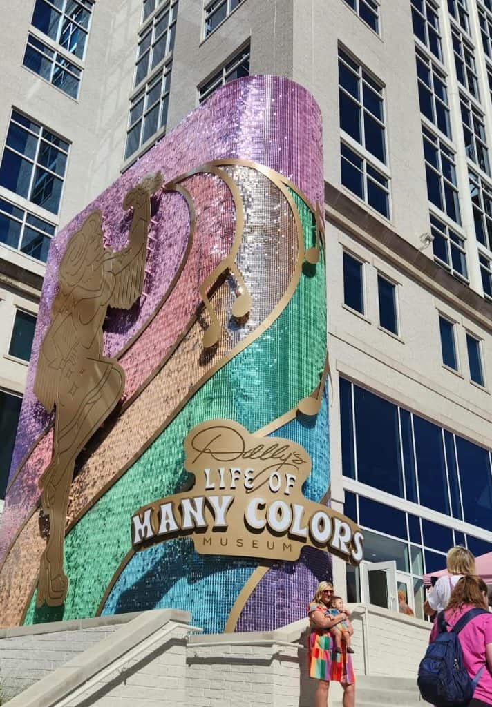 The sparkling mural outside of Dolly's Life of Many Colors Museum