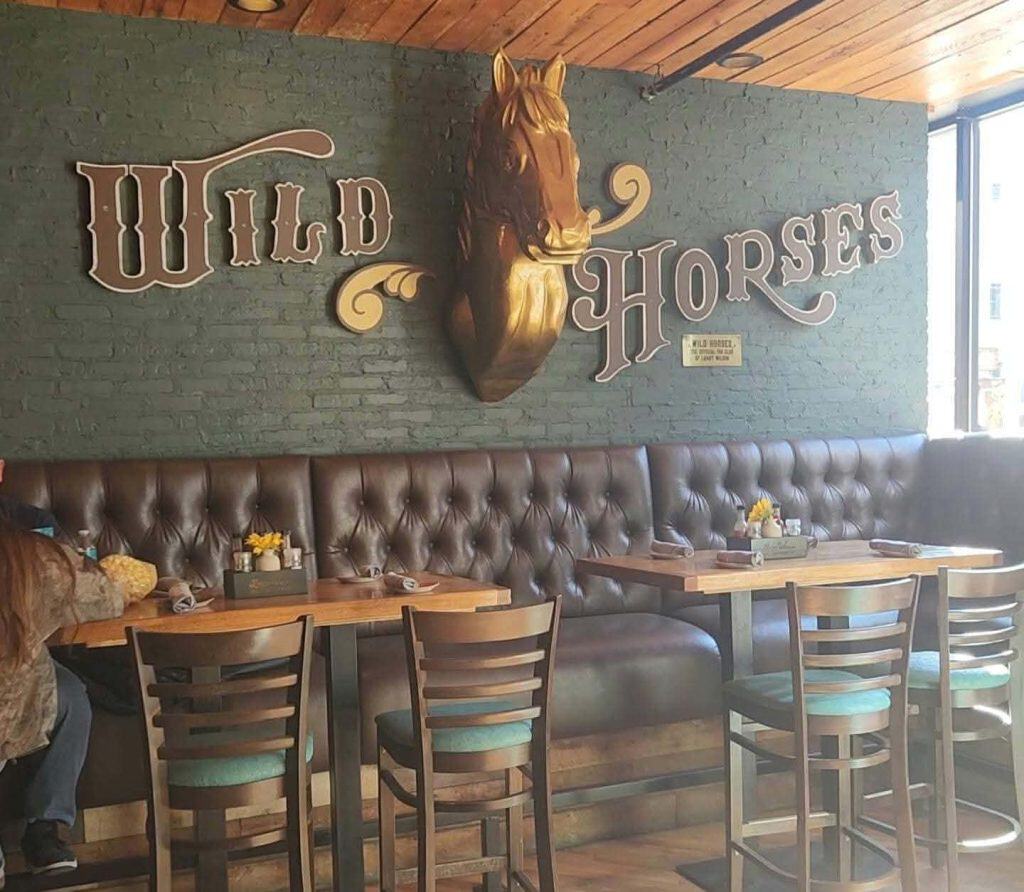 Wild Horses art work at Lainey Wilson's Bell Bottoms Up